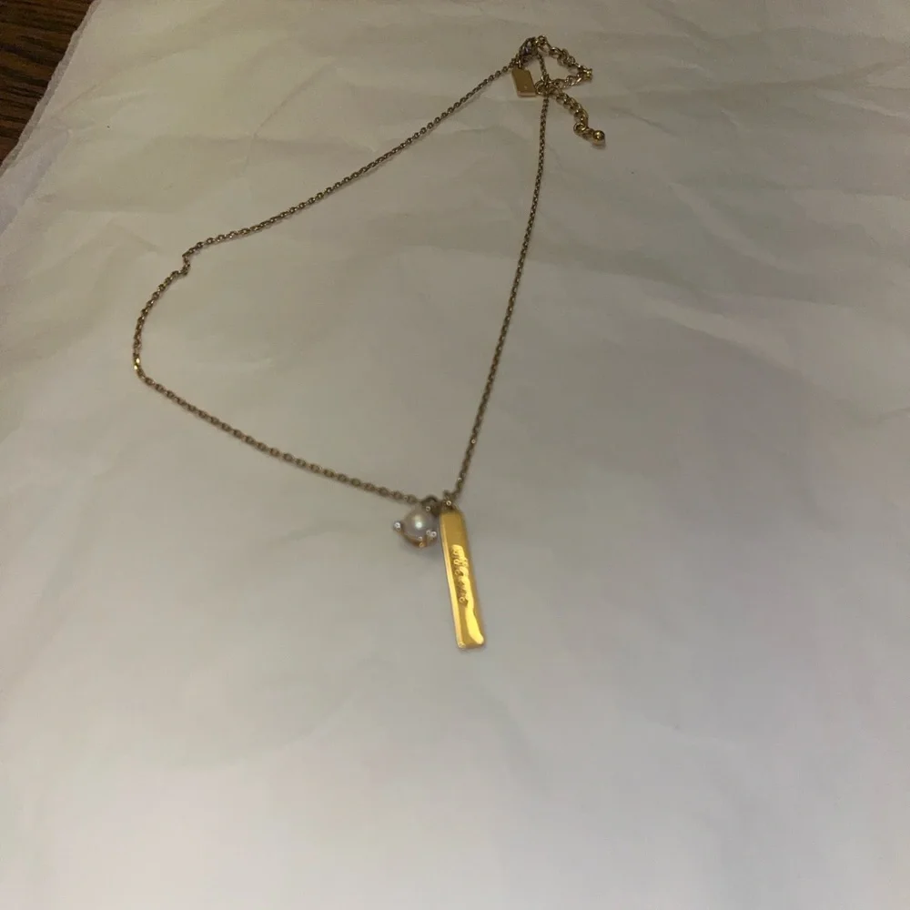 Kate Spade New York Gold-Tone Born To Be Wise One Cream Pendant Necklace